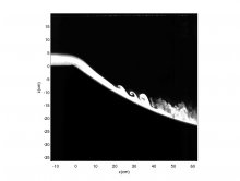 Spatially developing gravity currents onto concave slopes